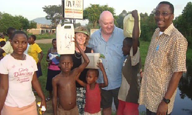 Milford Attorney Jane Holler and her husband, Attorney Dan Marecki formed the non-profit Uganda Farmers, Inc., 11 years ago. The non-profit brings much-needed water to rural Ugandan villages. Here the couple are seen in Ihunga, in western Uganda, with several villagers a few years ago.