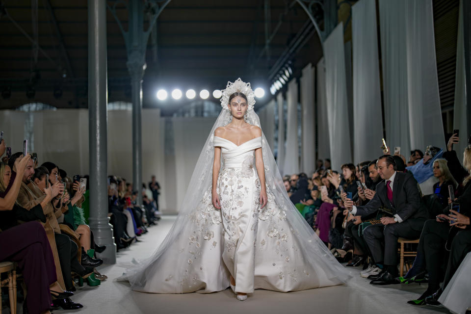 A model wears a creation as part of the Elie Saab Haute Couture Spring-Summer 2023 collection presented in Paris, Wednesday, Jan. 25, 2023. (AP Photo/Christophe Ena)