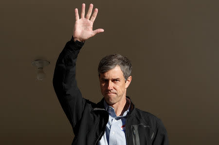 FILE PHOTO: U.S. Rep. Beto O'Rourke (D-TX), candidate for U.S. Senate waves from his front porch after voting in the 2018 midterm elections in El Paso, Texas, U.S., November 6, 2018. REUTERS/Mike Segar/File Photo