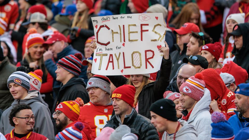 Kansas City Chiefs fans hold up a Taylor Swift sign during at Arrowhead Stadium in Kansas City in December. - William Purnell/Icon Sportswire/Getty Images