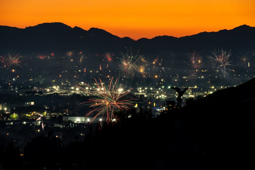 BURBANK, CA - JULY 04: Fireworks over North Hollywood, as seen from Burbank on Saturday, July 4, 2020 in Burbank, CA. (Kent Nishimura / Los Angeles Times)