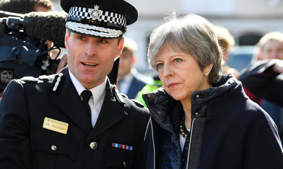 Theresa May talks to Wiltshire police’s chief constable Kier Pritchard in Salisbury on Thursday.
