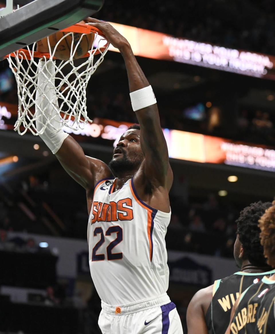 Phoenix Suns center Deandre Ayton throws down a two-handed dunk during first half action against the Charlotte Hornets at Spectrum Center in Charlotte, NC on Wednesday, February 1, 2023.