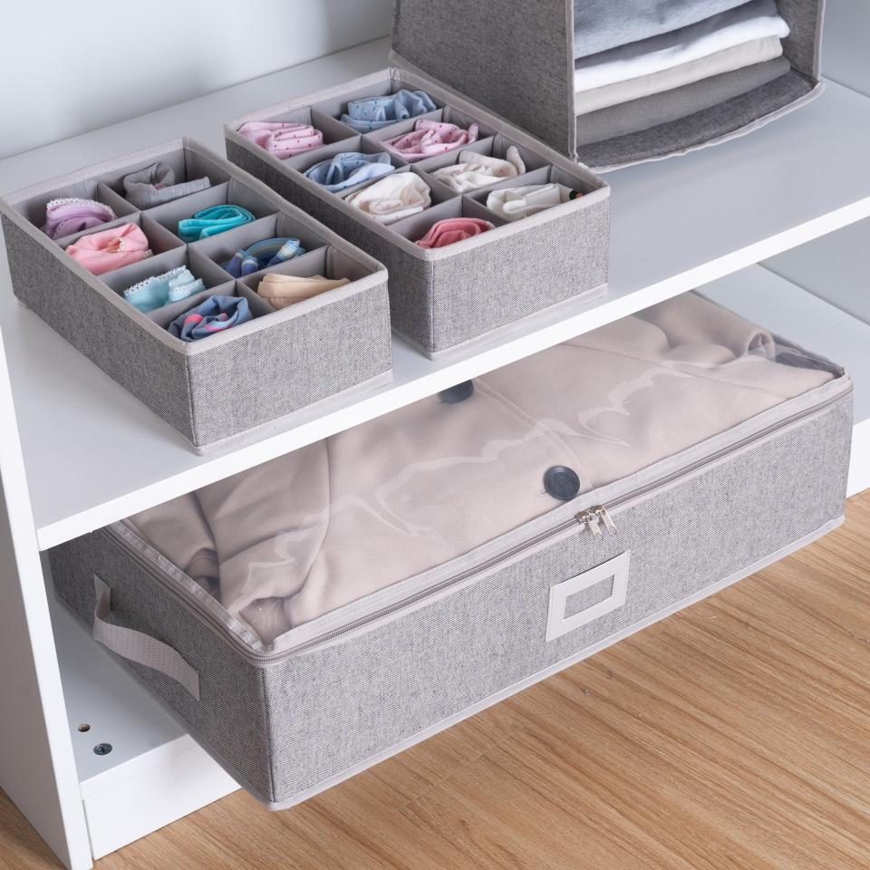 three gray under bed storage bins with dividers