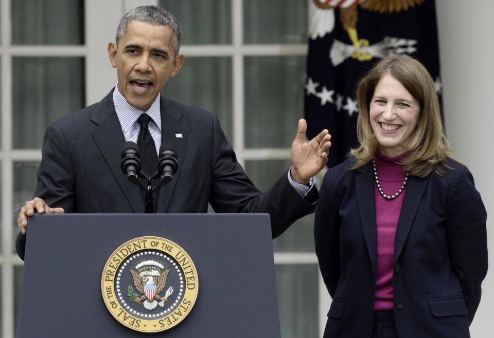 President Barack Obama, stands with his nominee to become Health and Human Services secretary, Budget Director Sylvia Mathews Burwell, while speaking in the Rose Garden of the White House in Washington, Friday, April 11, 2014, where he made the announcement. Burwell would replace Kathleen Sebelius who announced her resignation Thursday. (AP Photo/Susan Walsh)