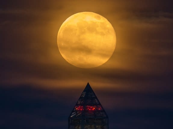 A supermoon rises over the Washington Monument on June 23, 2013.