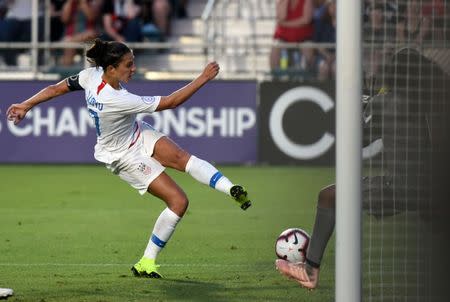 Oct 7, 2018; Cary, NC, USA; United States forward Carli Lloyd (10) has her shot stopped by Panama goalkeeper Yenith Bailey (1) during the second half of a 2018 CONCACAF Women's Championship soccer match at Sahlen's Stadium. Rob Kinnan-USA TODAY Sports