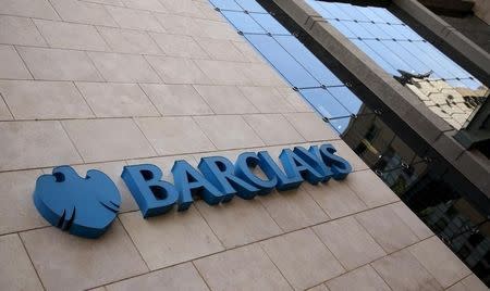 A Barclays logo is pictured outside the Barclays towers in Johannesburg December 16, 2015. REUTERS/Siphiwe Sibeko