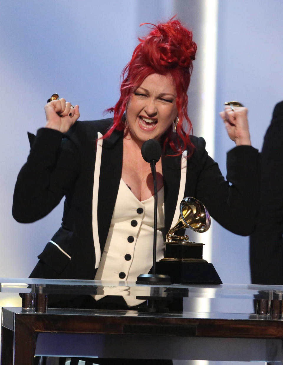 Cyndi Lauper accepts the best musical theater album award for "Kinky Boots" at the pre-telecast of the 56th annual GRAMMY Awards on Sunday, Jan. 26, 2014, in Los Angeles. (Photo by Matt Sayles/Invision/AP)