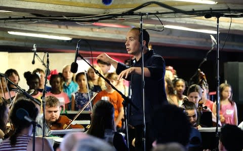 Christopher Stark conducts Bold Tendencies Multi-Storey Car Park with The Multi-Story Orchestra - Credit: Mark Allan/BBC