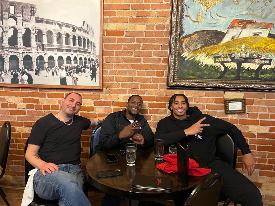 Green Bay Packers quarterback Jordan Love poses for a photo at Angelina Restaurant in Green Bay with executive chef Ermano Cervantes and owner Eddie Boyce. Angelina is Love's favorite Italian restaurant when he's in town.