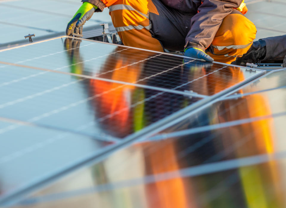 Solar panels installation on rooftop, ideal for any renewable article or wallpaper