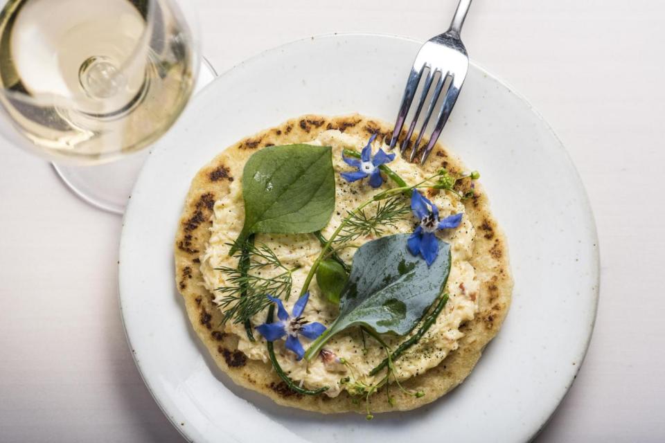 Soft, pliable but slightly charred: grilled flatbread with freshly picked crab (Daniel Hambury/Stella Pictures)