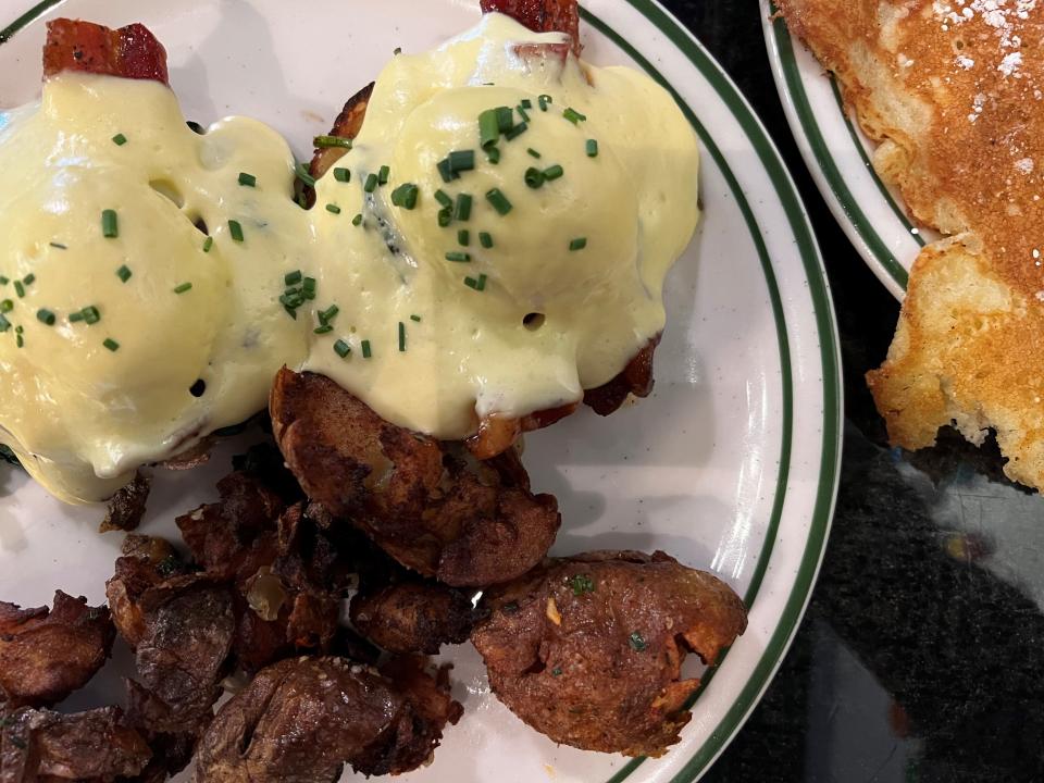 Decadent, and worth every calorie, the candied bacon Benny at Little Brother.