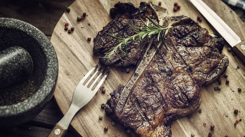 Grilled steak on cutting board