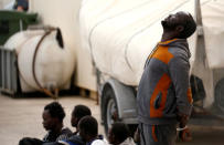 Migrants are seen after disembarking from an Armed Forces of Malta patrol boat at its base in Marsamxett Harbour, Valletta, Malta May 25, 2019. REUTERS/Darrin Zammit Lupi