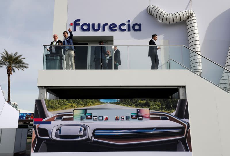 FILE PHOTO: An illustration shows a car dashboard with a giant screen on the side of the Faurecia booth during the 2019 CES in Las Vegas