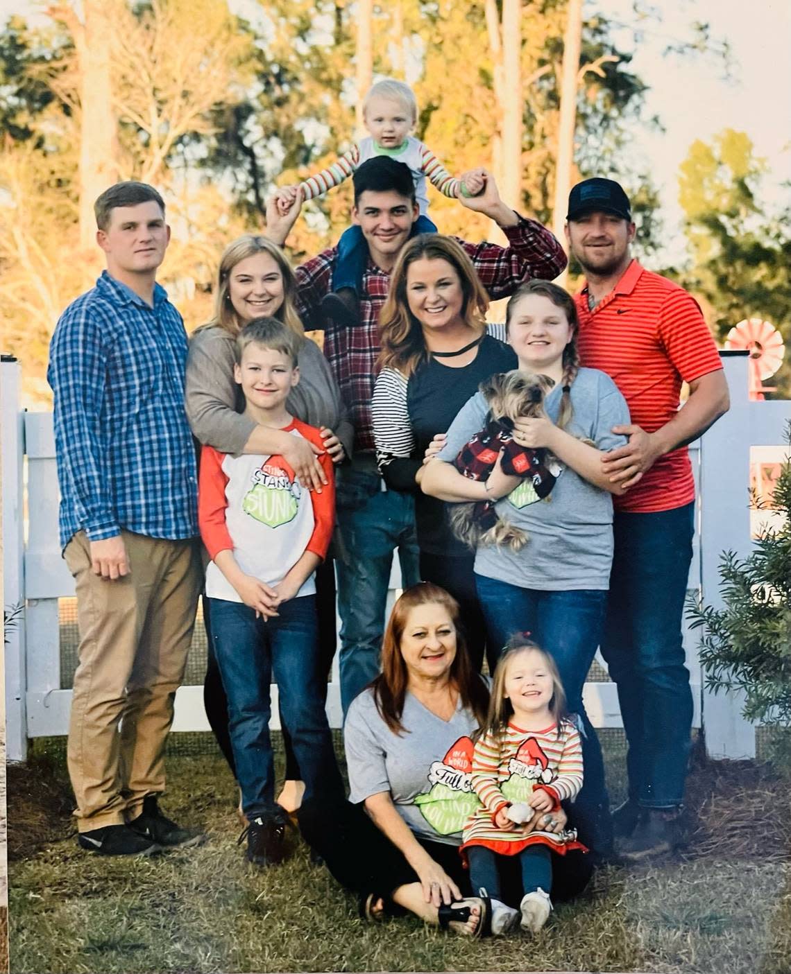 Brandon Cox, far right, Kelly Mabie, center blue shirt, are pictured here with their blended family. The couple, with plans to wed in March, are opening an Another Broken Egg Cafe franchise in Warner Robins along with business partners Ian Payne and Raymond Kimsey (not pictured) of Premier Contracting Solutions,