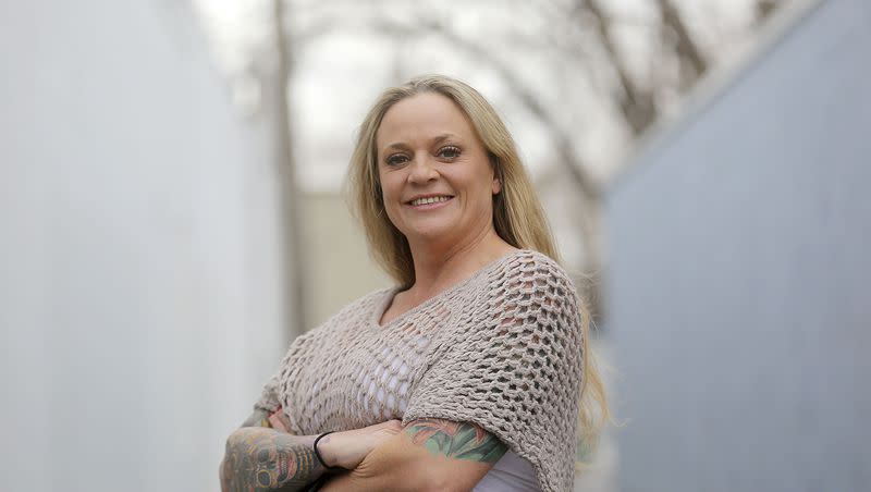 Mindy Vincent poses for a portrait outside of Let’s Do Something Productions, where she records her podcast, “Therapeutic Madness,” in South Salt Lake on Dec. 17, 2020. Vincent, a recovering drug addict and now a licensed clinical social worker who has turned her life around, is suing the government to restore her right to own a gun, which was revoked after she was convicted of bank fraud for trying to cash a $500 check in 2008.