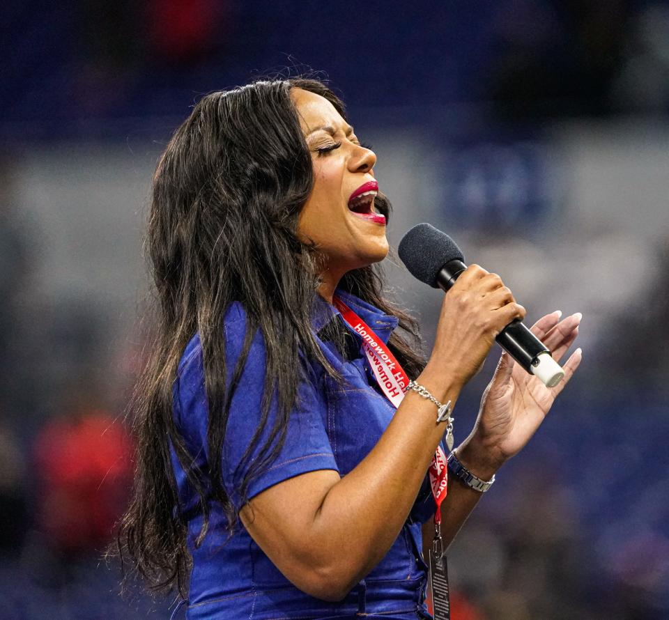 Racheal Martin-Clark performs the Black National Anthem during the Circle City Classic Battle of the Bands on Saturday, Sept. 24, 2022, at Lucas Oil Stadium. 