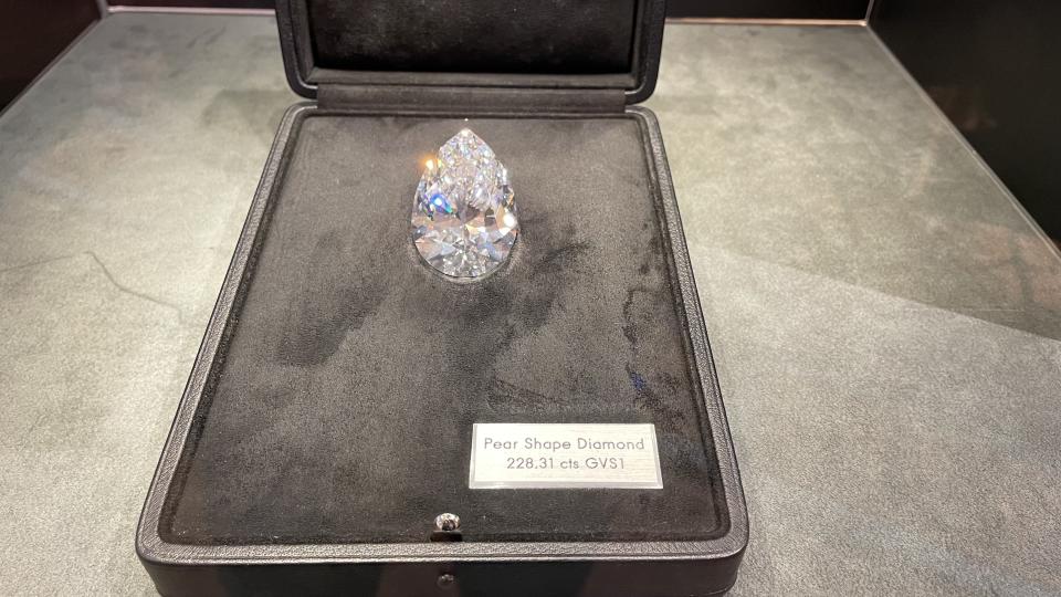 GENEVA, SWITZERLAND - MAY 11: World's largest diamond 'The Rock', which is 228,31 carat, is seen as it is sold for 18.7 Swiss francs ( 18.8 million US Dollars) at Christieâs auction house in Geneva, Switzerland on May 11, 2022. Business people, collectors competed with bids to get World's largest diamond at the auction. (Photo by Omer Faruk Yildiz/Anadolu Agency via Getty Images)