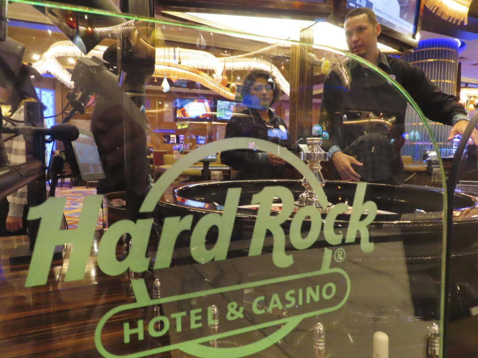 Dealers conduct a game of roulette at the Hard Rock casino in Atlantic City, N.J., on May 17, 2023. The city's two newest casinos - Hard Rock and Ocean - which both opened on June 27, 2018, have become the second and third most successful Atlantic City casinos in terms of money won from in-person gamblers. (AP Photo/Wayne Parry)