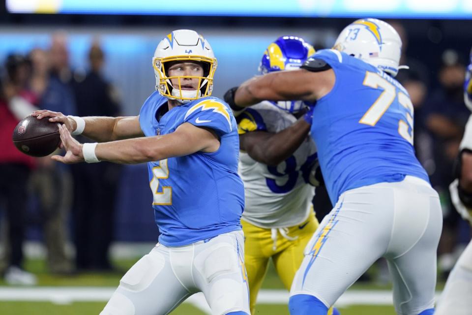 Quarterback Easton Stick passes for the Chargers during the second half Aug. 13, 2022.