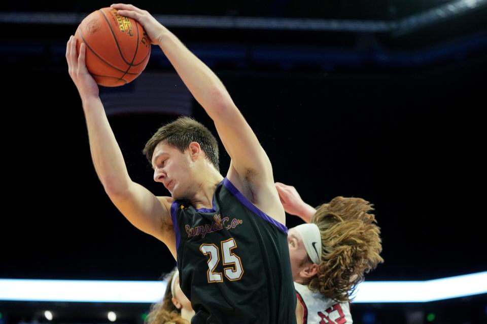 Campbell County Camels power forward Connor Weinel (25) pulls down a rebound in the second half of a quarterfinal game against the Harlan County Black Bears during the 2024 KHSAA boys state basketball tournament, Friday, March 22, 2024, at Rupp Arena in Lexington, Ky.