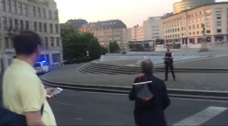 A still image from video shows a police vehicle arriving outside Brussels central station in Brussels, Belgium June 20, 2017. Courtesy Twitter/@TobiaszMadejski/Radio Szczecin/via REUTERS