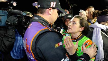 An upset Danica Patrick talks with Denny Hamlin about their late accident after the second Budweiser Duel.