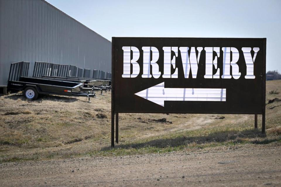 A large sign points the way to the Kansas Territory Brewery Co. in an industrial park in Washington, Kansas. The brewery sits next to Bradford Built Inc., a manufacturing company for trailers and truck beds. Both companies were founded by Brad Portenier, who is expanding the brewery with plans to make a destination brewery, distillery, wedding and music venue.
