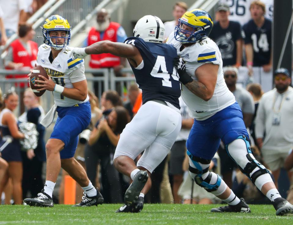 Penn State's Chop Robinson tries to get past Delaware offensive tackle Blaise Sparks and get to quarterback Ryan O'Connor during a game last September.