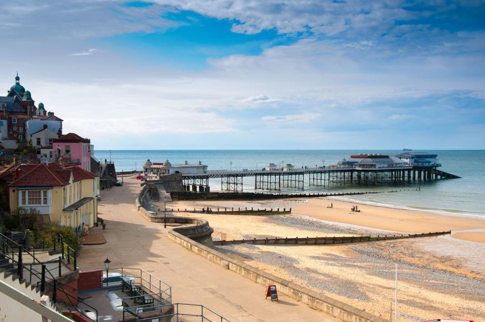 a view of promenade, town centrem, and pier, cromer, seaside town in norfolk, england