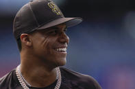 San Diego Padres right fielder Juan Soto smiles during batting practice before team's baseball game against the Colorado Rockies on Wednesday, Aug. 3, 2022, in San Diego. (AP Photo/Gregory Bull)