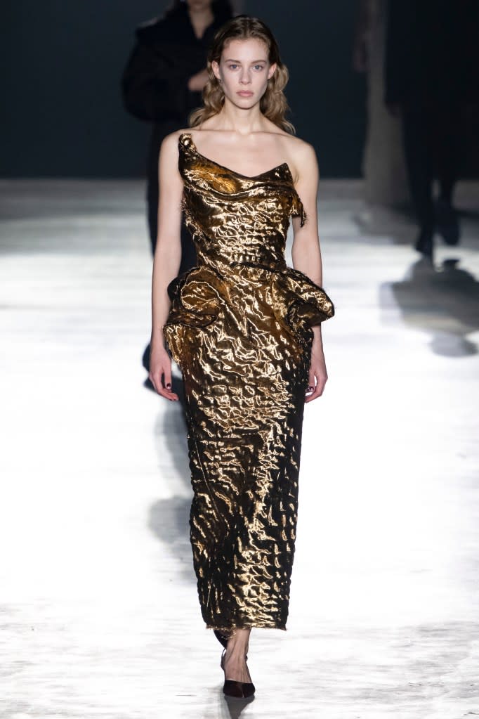 This golden warrior goddess is the epitome of power and grace, as captured throughout <a href="https://news.yahoo.com/gilded-age-star-louisa-jacobson-193616503.html" data-ylk="slk:Jason Wu’s;elm:context_link;itc:0;sec:content-canvas;outcm:mb_qualified_link;_E:mb_qualified_link;ct:story;" class="link  yahoo-link">Jason Wu’s</a> NYFW collection. Gamma-Rapho via Getty Images