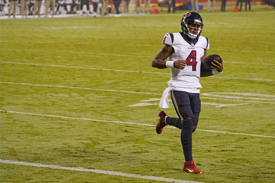 Houston Texans quarterback Deshaun Watson scores a touchdown on a 1-yard run against the Kansas City Chiefs in the second half of an NFL football game Thursday, Sept. 10, 2020, in Kansas City, Mo. (AP Photo/Charlie Riedel)