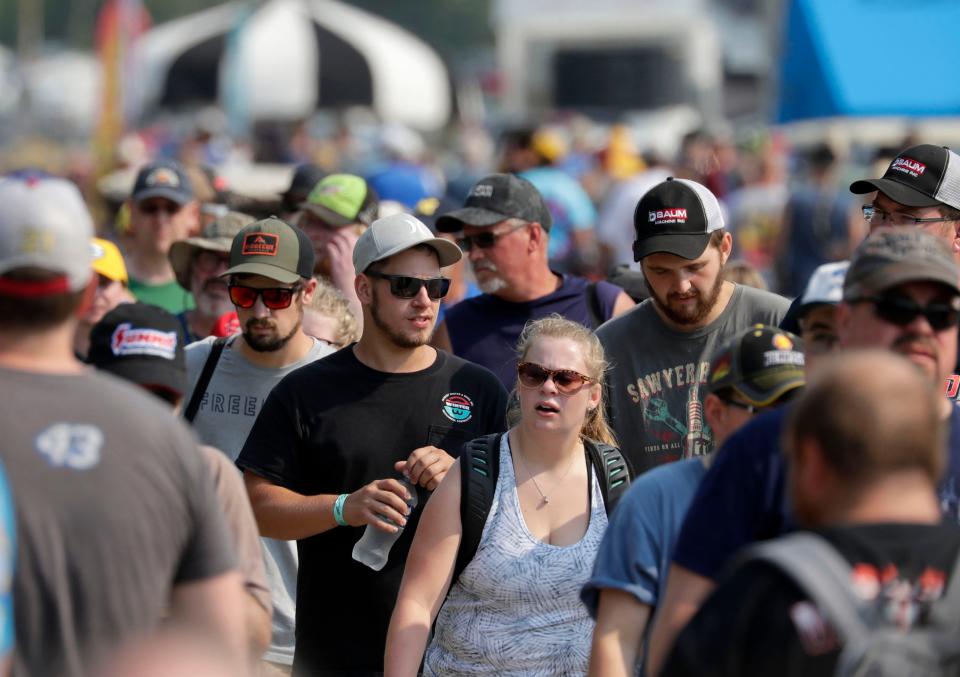 Fans crowd Road America near the NASCAR garage area before the Cup Series race at the track on July 4, 2021.