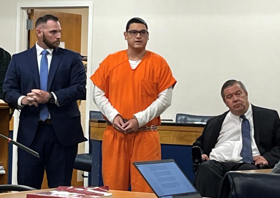 Oscar Gil, 25, of Fort Pierce, stands with his defense attorneys, Adam Less, on left, and Lance P. Richard, on right, as he addresses relatives of murder victim Diana Ortiz, 23, of Fort Pierce, during Gil’s sentencing hearing Aug. 12, 2022 at the Martin County Courthouse.  Gil was ordered to serve life in prison for the first-degree murder of Ortiz on Sept. 14, 2019 at Jensen Public Beach on Hutchinson Island in Martin County.