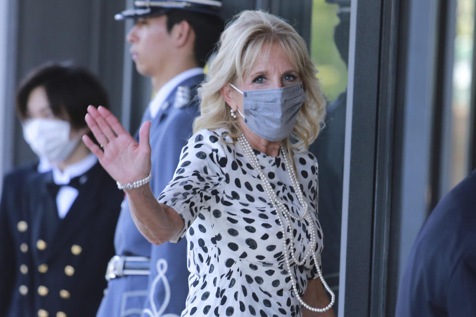 U.S. first lady Jill Biden waves as she arrives at Imperial Palace to meet Japan's Emperor Naruhito in Tokyo, Friday, July 23, 2021. (AP Photo/Koji Sasahara, Pool)