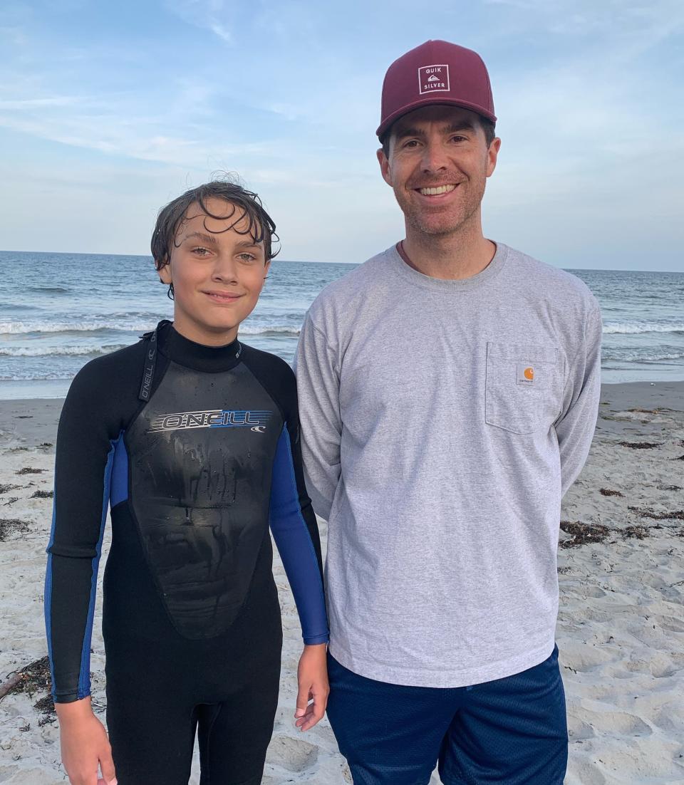 Adam O'Kane shares some sun with little brother, James, after a surfing lesson at Rye Beach. The Hampton native was recently named the New Hampshire Big Brother of the Year for his efforts both in person and remotely during the pandemic mentoring James.