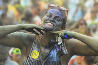 RIO DE JANEIRO, BRAZIL - DECEMBER 16: A woman smiles during The Color Run on December 16, 2012 in Rio de Janeiro, Brazil. (Photo by Ronaldo Brandao/NewsFree/LatinContent/Getty Images)