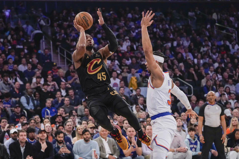 Cleveland Cavaliers guard Donovan Mitchell (45) goes to the basket past New York Knicks guard Josh Hart (3) in the first half of Game 4 in an NBA basketball first-round playoff series, Sunday, April 23, 2023, at Madison Square Garden in New York. (AP Photo/Mary Altaffer)