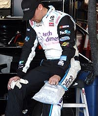 Denny Hamlin stayed in his car at Phoenix despite the obvious pain in his knee