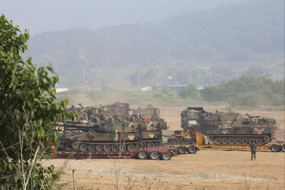 South Korean army's K-55 self-propelled howitzers are loaded on vehicles in Paju, near the border with North Korea, South Korea, Wednesday, June 17, 2020. North Korea said Wednesday it will redeploy troops to now-shuttered inter-Korean tourism and economic sites near the border with South Korea and take other steps to nullify landmark 2018 tension-reduction deals. (AP Photo/Ahn Young-joon)