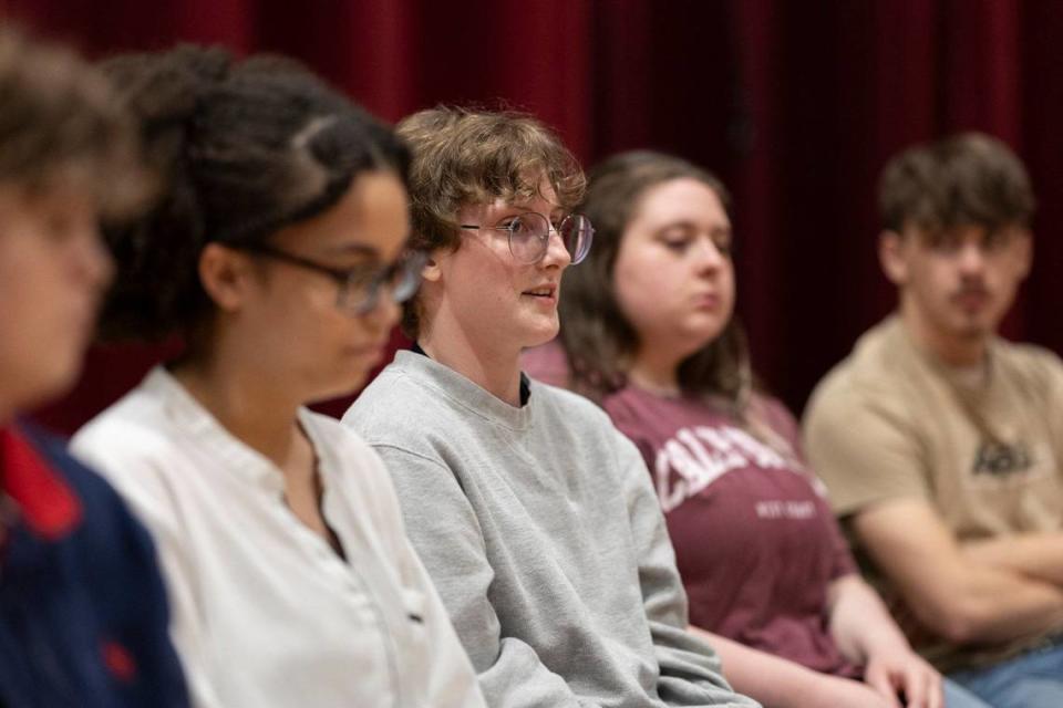 Recent Harlan County High School graduate Adrianna Hockenberry, center, is photographed at the school in Harlan, Ky., on Wednesday, May 8, 2024.