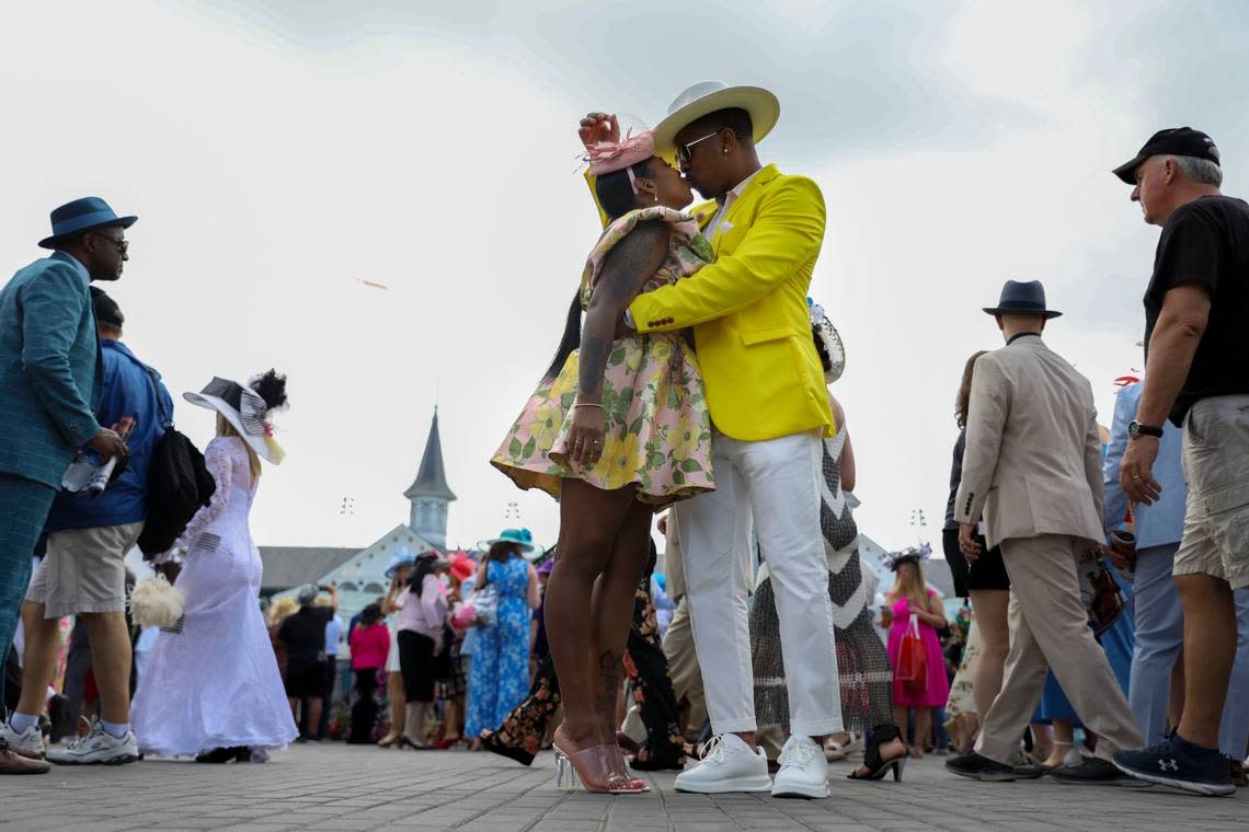 Jasmine Aleem and Nick Gooding coordinate in yellow for the Kentucky Derby 150 at Churchill Downs.