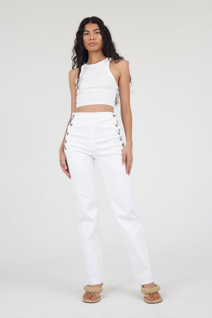 <p>ebdenim.com</p><p><strong>$283.00</strong></p><p><a href="https://www.ebdenim.com/collections/all-products-excluding-route/products/new-chain-pants-white" rel="nofollow noopener" target="_blank" data-ylk="slk:Shop Now" class="link ">Shop Now</a></p><p>The chain detail along the sides make this pair from EB Denim instantly recognizable. </p>