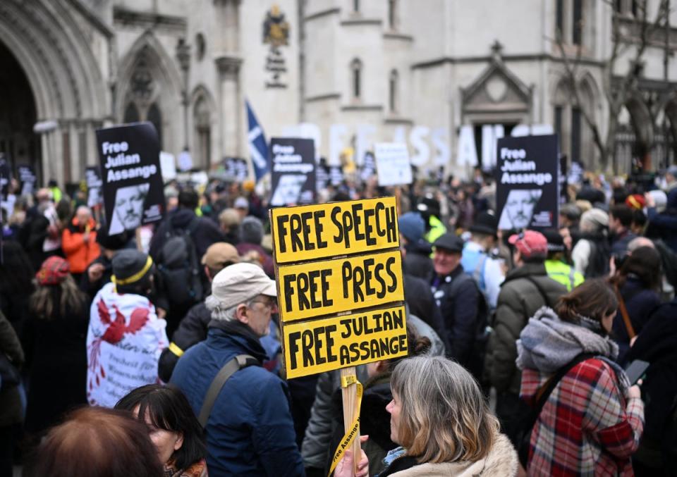 Demonstrators show their support to Assange before the appeal hearing on Tuesday morning (AFP via Getty Images)
