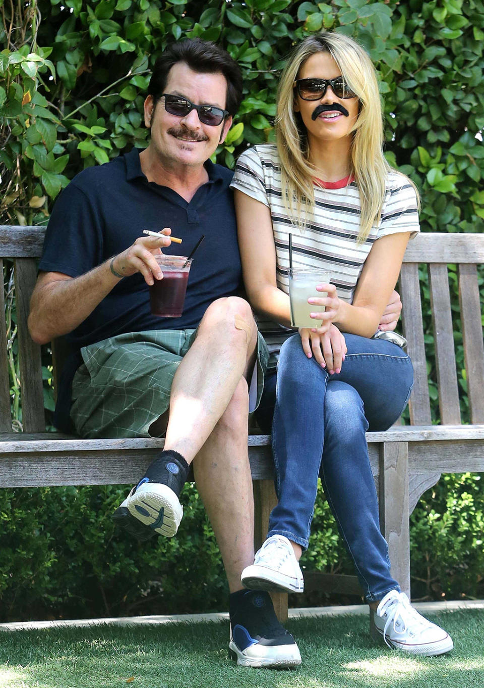 <p>If Sheen had actually been trying to evade cameras by wearing a mustache and getting girlfriend Julia Stambler to do so too, then this would have been a total fail. However, we suspect that Sheen was happy to be photographed during a weekend getaway at the Bacara Resort & Spa in Santa Barbara, Calif. (Photo: BACKGRID USA) </p>