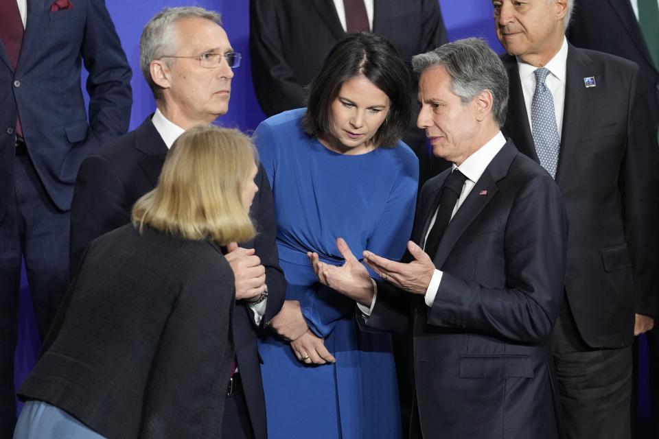 NATO Secretary General Jens Stoltenberg, top left, Norway's Foreign Minister Anniken Huitfeldt, bottom left, Germany's Foreign Minister Annalena Baerbock, center, and U.S. Secretary of State Antony J. Blinken chat during a meeting of NATO foreign ministers in Oslo, Norway, Thursday, June 1, 2023. (AP Photo/Sergei Grits)